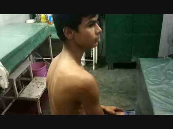 school Principal beat child brutally with stick school Principal beat child brutally with stick