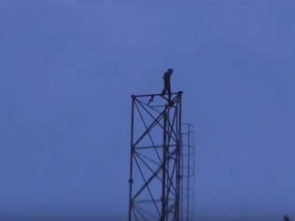 man climbs tower in mainpuri man climbs tower in mainpuri