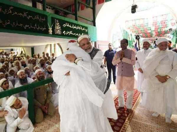 Photoshopped image of PM Modi wearing Muslim skull cap shared on social media Photoshopped image of PM Modi wearing Muslim skull cap shared on social media