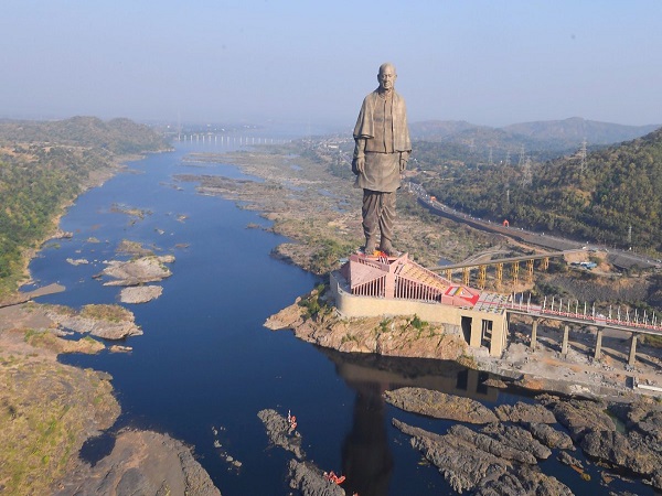 Sardar Patels family and relatives pose for a group photograph with Statue Of Unity