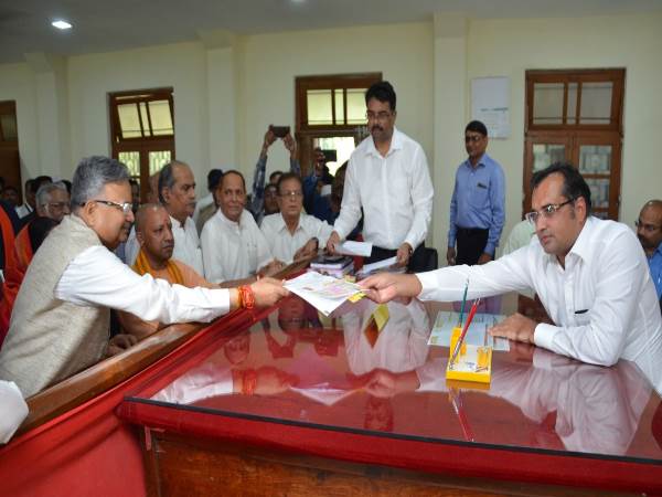 raman singh files his nomination in the presence of yogi adityanath in raipur 