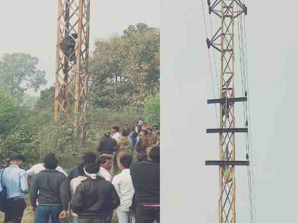 husband with his baby climbs on the tower seeks to call her wife in agra