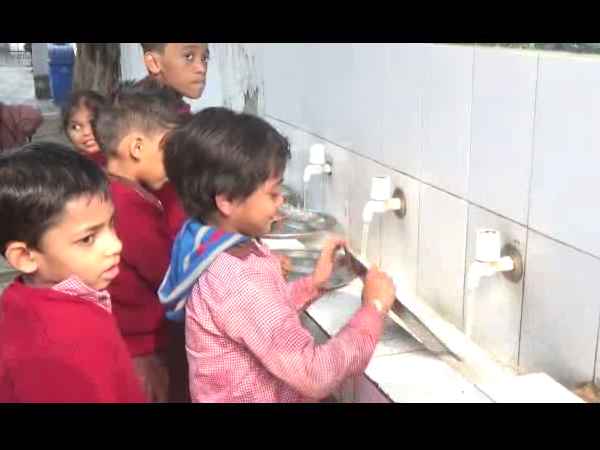 utensil washed by children After eating mid-day meal in school in ghaziabad