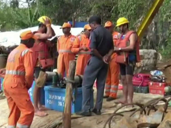 meghalaya mines operations underway to trace 15 trapped miners 3 helmets recovered