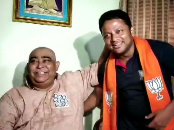 टीएमसी नेता अनुब्रत मंडल से मिले बीजेपी उम्मीदवार अनुपम हाजरा, छुए पैर