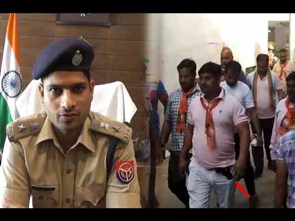 BJP supporter with pistol during election campaign