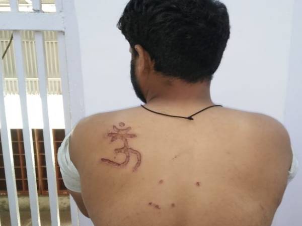 om tattoo on back of muslim prisoner in tihar jail, complained at Karkardooma court om tattoo on back of muslim prisoner in tihar jail, complained at Karkardooma court