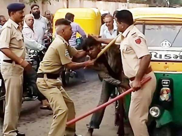 gujarat high court to police officer not to beat accused publicly