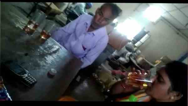 Video of peon drinking wine in govt office went viral