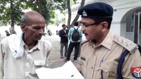 son beats his father and drag him outside the home