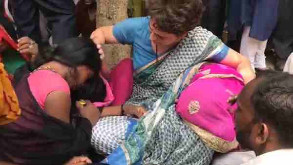 pictures of Priyanka Gandhi weeping during Sonbhadra victims family meeting