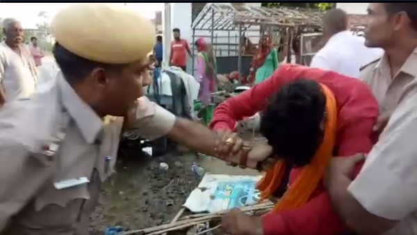 BJP Parshad Beaten By SHO of Nagar Police Station in Bharatpur BJP Parshad Beaten By SHO of Nagar Police Station in Bharatpur