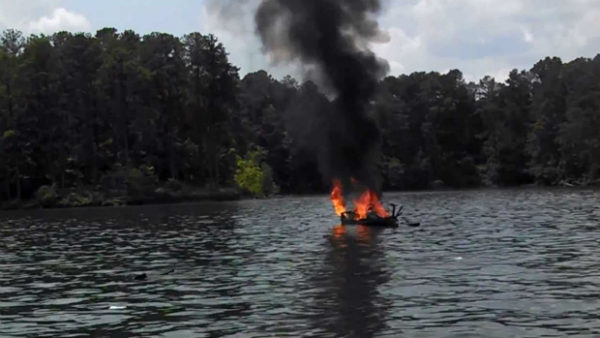 A houseboat with an onboard floating restaurant burnt near Morjim beach Goa A houseboat with an onboard floating restaurant burnt near Morjim beach Goa