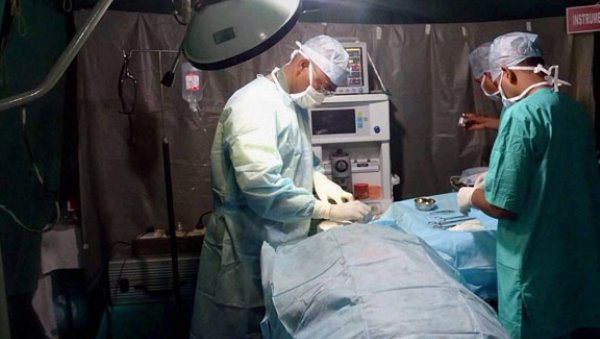 कूकर में दाल बना रही थी महिला कूकर में दाल बना रही थी महिला