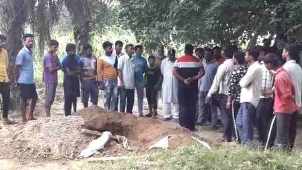 woman body found outside grave