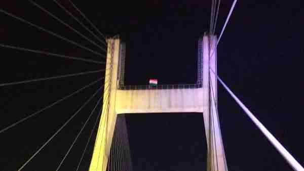 A man climbs over the bridge to establish a connection between ISRO and Vikram Lander