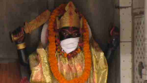 People wear masks to save God from air pollution People wear masks to save God from air pollution
