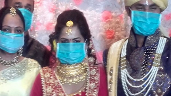Bride and Groom Used masks due to Coronavirus fear Bride and Groom Used masks due to Coronavirus fear
