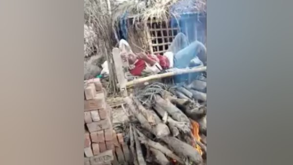 खुद की चिता सजाकर उसपर लेट गया युवक