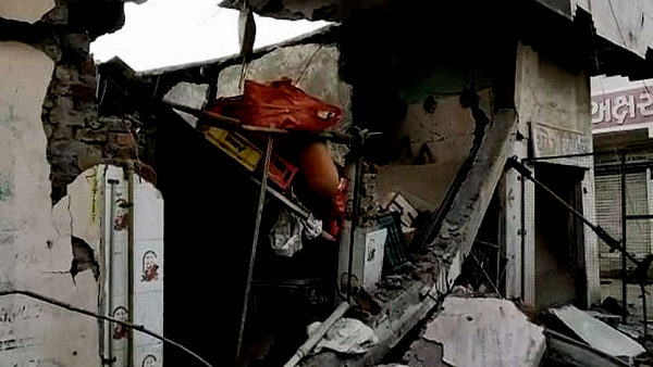 Sharp explosion in the Shop at rajkot district gujarat, building collapsed Sharp explosion in the Shop at rajkot district gujarat, building collapsed