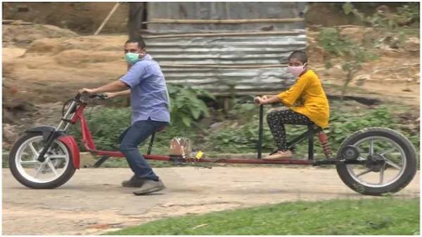त्रिपुरा में ही एक युवक ने बनाया विशेष सोशल डिस्टेंसिंग बाइक 