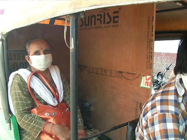 auto driver change in three wheeler to save passenger from infection of covid-19 auto driver change in three wheeler to save passenger from infection of covid-19