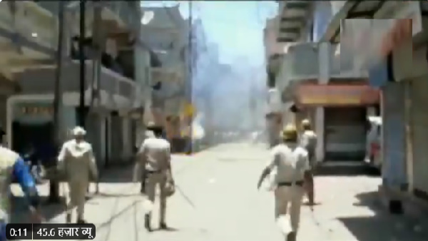 Watch Video: clash erupts between migrant workers and gujarat police in Surat during covid 19 lockdown