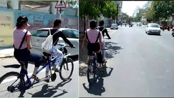 Watch Video: Two girls of gujarat driving on a unique cycle amidst lockdown relaxation, following social distancing Watch Video: Two girls of gujarat driving on a unique cycle amidst lockdown relaxation, following social distancing
