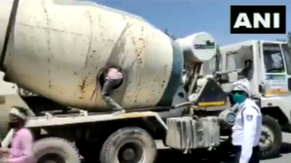 कंक्रीट मिक्सर ट्रक के मिक्सर टैंक 18 लोग छिपे कंक्रीट मिक्सर ट्रक के मिक्सर टैंक 18 लोग छिपे