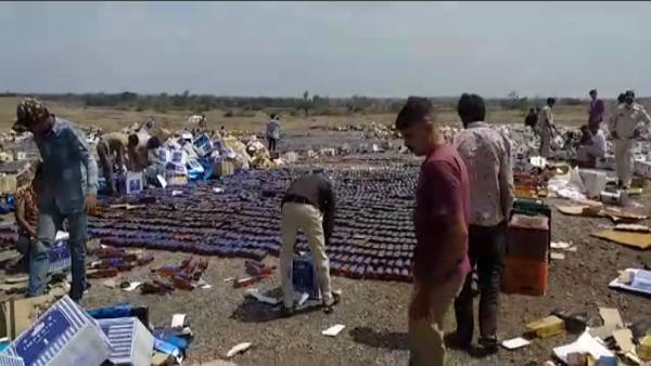 Watch video: more than one lakh liquor bottles destroyed at rajkot, know how these found in a state