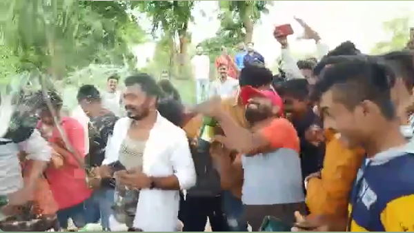 BJP Youth Front leader cuts cake with sword, celebrates with beer