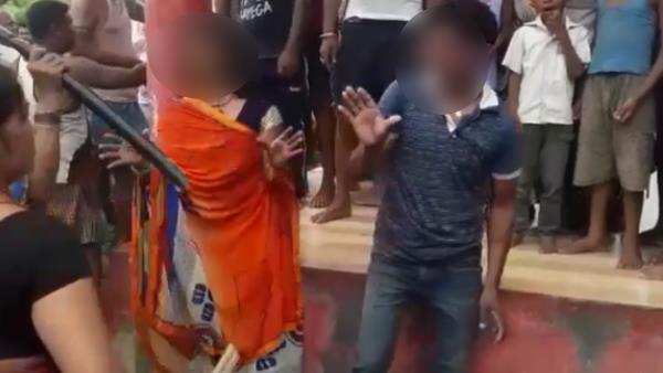 woman tied up to pillar and beaten by goons in bettiah video viral woman tied up to pillar and beaten by goons in bettiah video viral