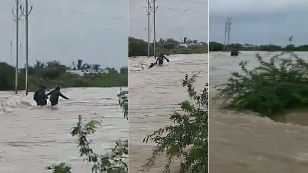 watch: three men drown in the waterlogged road, one saved by locals