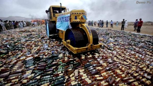 66088 Illegal liquor bottles destroyed by Bulldozer in anand gujarat 66088 Illegal liquor bottles destroyed by Bulldozer in anand gujarat