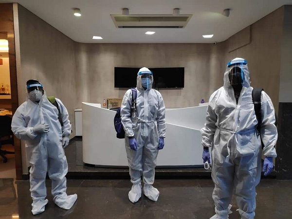 for the first time in country, ahmedabad income tax department raid with ppe kits