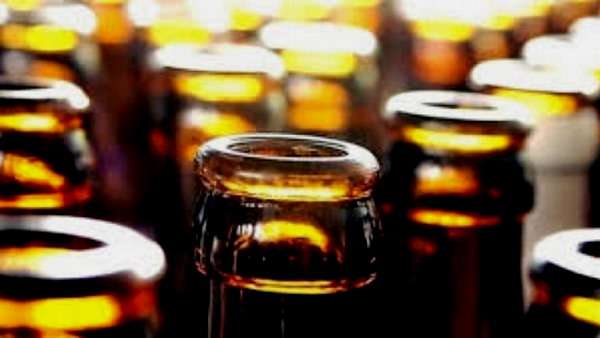66088 Illegal liquor bottles destroyed by Bulldozer in anand gujarat 66088 Illegal liquor bottles destroyed by Bulldozer in anand gujarat