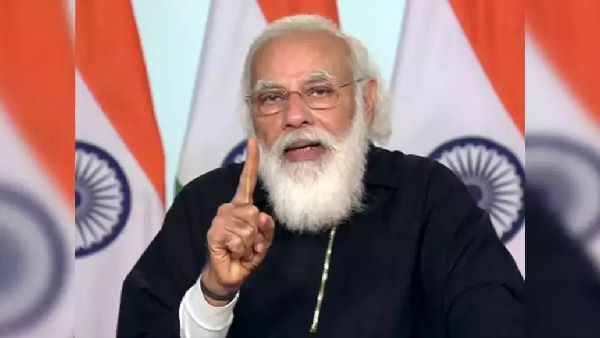 PM Narendra Modi lays foundation stone for 1,144 houses in Gujarat CM Vijay Rupani Hometown Rajkot PM Narendra Modi lays foundation stone for 1,144 houses in Gujarat CM Vijay Rupani Hometown Rajkot