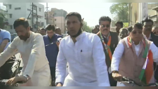 Congress MLAs ride bicycle to Legislative Assembly, in protest against the rising fuel prices