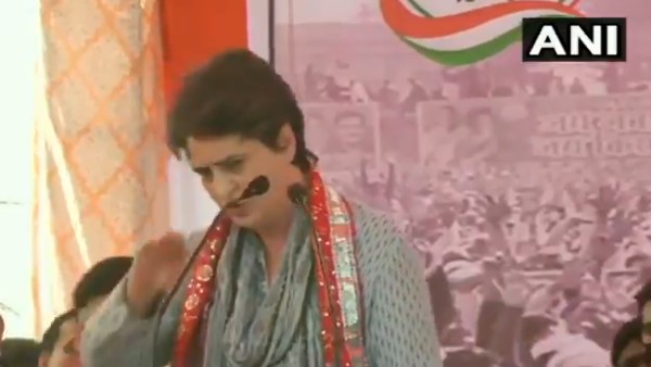 priyanka gandhi got down from stage and meet physical attack victim in mathura priyanka gandhi got down from stage and meet physical attack victim in mathura