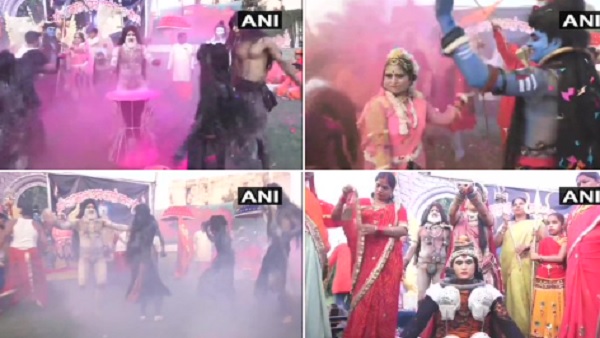 Holi 2021: कहीं उड़ा गुलाल तो कहीं हो रही है आरती, Pics