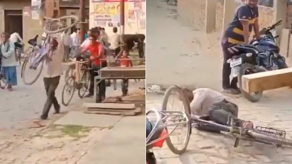 नशे में साइकिल को उठाया कंधे पर