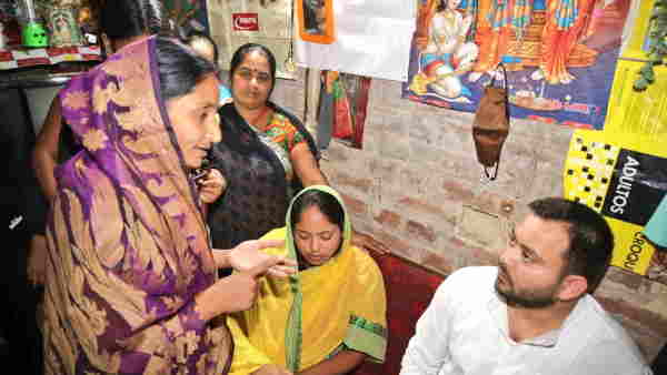 tejashwi yadav met with madhubani victim family tejashwi yadav met with madhubani victim family