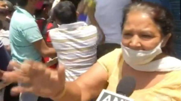 viral video of daru wali aunty delhi woman dolly liquor shop coronavirus viral video of daru wali aunty delhi woman dolly liquor shop coronavirus