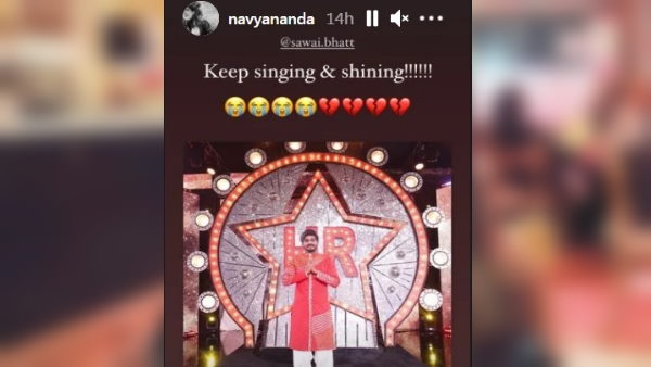 नव्या रोती हुई इमोजी और टूटे हुए दिल का इमोटीकॉन शेयर किया