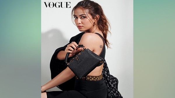 ब्लैक लुइस वुइटन कैपुसीन बैग के साथ फोटोशूट 