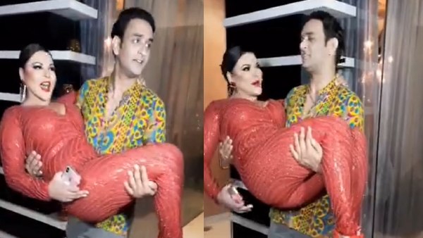 राखी को विकास ने गोद में उठाया राखी को विकास ने गोद में उठाया