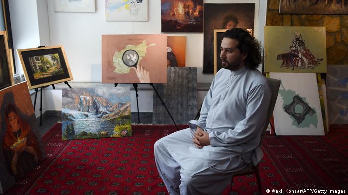 afghan art activist defiant as taliban erase kabul murals afghan art activist defiant as taliban erase kabul murals