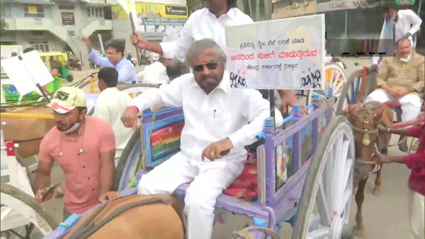 Karnataka: Congress leaders Siddaramaiah and D.K. Shivakumar tonga yatra to assembly in Bengaluru against rising petrol diesel prices
