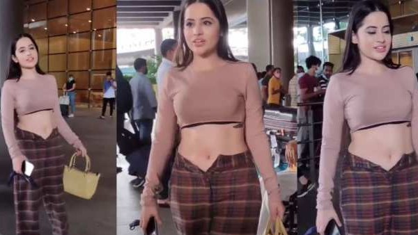 पैंट की बटन खोलकर पहुंचीं एयरपोर्ट