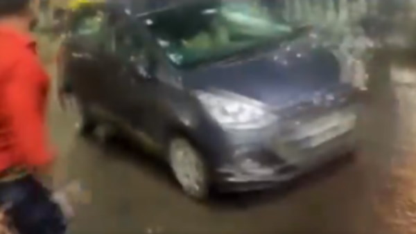 WATCH car rammed into people during Durga idol immersion procession in Bhopal two injured WATCH car rammed into people during Durga idol immersion procession in Bhopal two injured